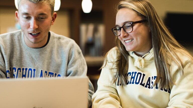 St. Cloud students laugh and chat while studying