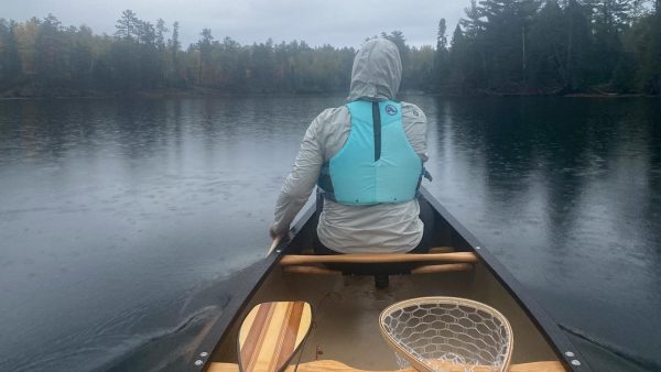Michelle Ruszat Klee on a lake in a canoe.